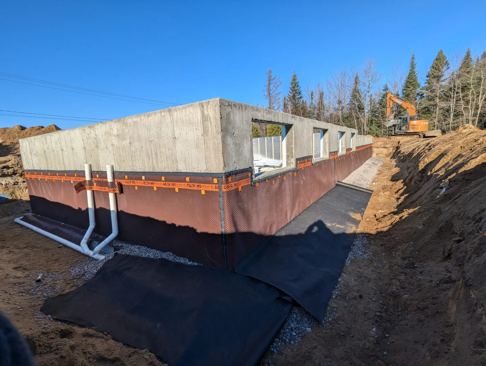 Conduites de drainage installées autour d’une fondation